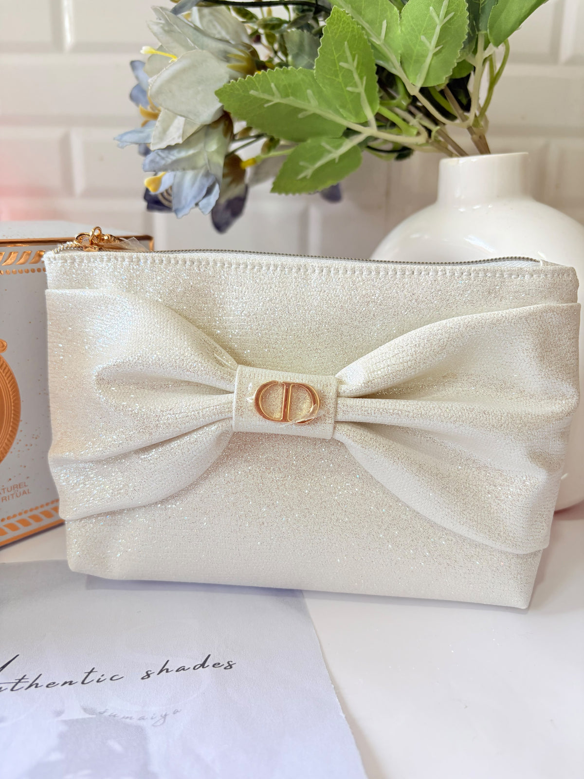 Dior limited edition white sparkly bow pouch