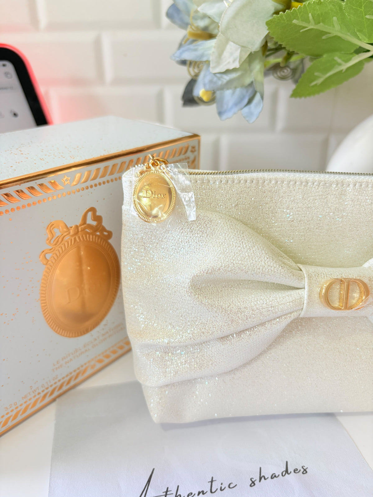 Dior limited edition white sparkly bow pouch